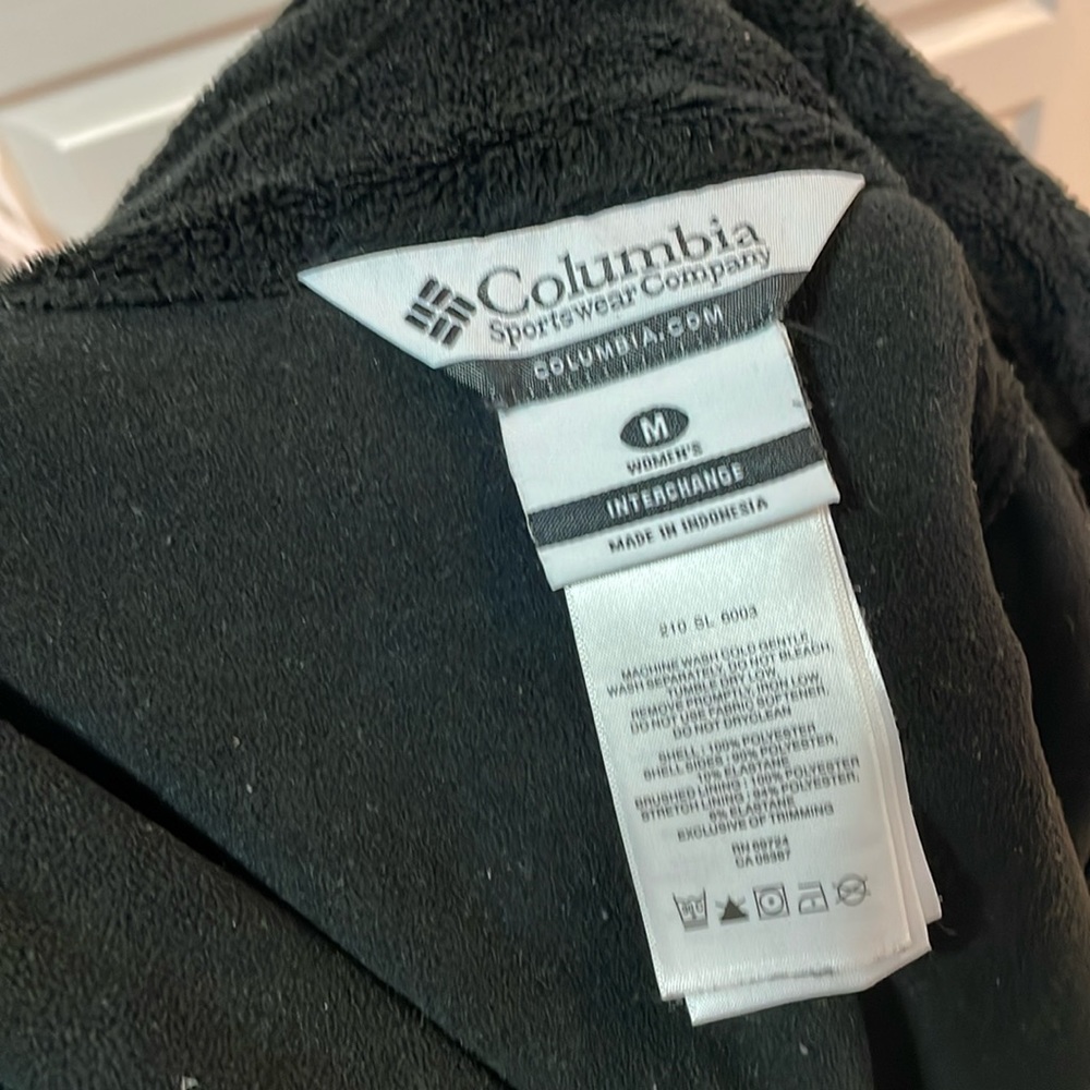 Columbia jacket excellent condition black with soft outer fur